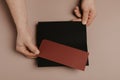 Hand holding blank envelope and letter mockup Royalty Free Stock Photo