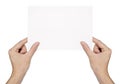 Hand holding blank paper isolated Royalty Free Stock Photo