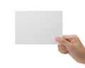 Hand holding blank paper isolated on white background with clipping path, Greeting card mockup. Royalty Free Stock Photo