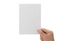 Hand holding blank paper isolated on white background with clipping path, Greeting card mockup. Royalty Free Stock Photo