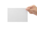 Hand holding blank paper isolated on white background with clipping path, Greeting card mockup. Royalty Free Stock Photo