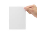 Hand holding blank paper isolated on white background with clipping path, Greeting card mockup. Royalty Free Stock Photo