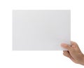 Hand holding blank paper isolated on white background with clipping path, Poster Mockup. Royalty Free Stock Photo