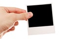 Hand holding blank photo