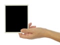 Hand holding blank photo frame Royalty Free Stock Photo