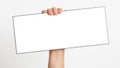 Hand holding blank sign, isolated on white background Royalty Free Stock Photo