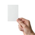A hand holding a blank white card in front of a plain white background Royalty Free Stock Photo