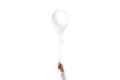 Hand holding blank white pear balloon mockup, isolated Royalty Free Stock Photo