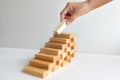 Hand holding blocks wood game, Concept Risk of management and strategy plan, growth business success process and team work Royalty Free Stock Photo
