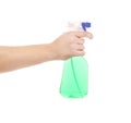 Hand holding blue plastic spray bottle. Royalty Free Stock Photo