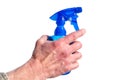 Hand Holding Blue Spray Bottle