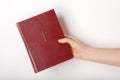 Hand holding the book bible Royalty Free Stock Photo