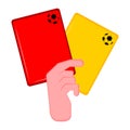 Hand holding both red and yellow card Royalty Free Stock Photo