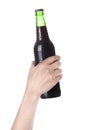 Hand holding Bottle of dark beer Royalty Free Stock Photo