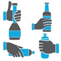 Hand holding bottle