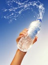 Hand holding a bottle of water Royalty Free Stock Photo