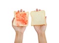 Hand holding bread and Strawberry jam making for breakfast on white background