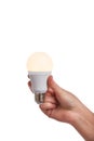 Hand holding bright led light bulb Royalty Free Stock Photo