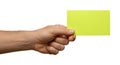 hand holding a bright yellow rectangular card Royalty Free Stock Photo