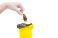 Hand holding brown cockroach and bin yellow Isolated on a white background