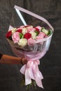 Buquet of various roses on the dark background