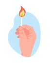 Hand holding burning match. Wooden stick with flammable Sulphur. Matchstick blazing. Bonfire danger. Flame ignition