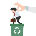 Hand holding businessman recycling concept