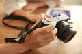 Hand holding camera with showing back screen Royalty Free Stock Photo