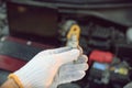 Hand holding car repair tools