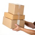 Hand holding cardboard boxes isolated on white background Royalty Free Stock Photo
