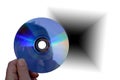 Hand holding cd or dvd disc close up Royalty Free Stock Photo