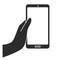 Hand holding cell phone. Blank screen frame. Isolated vector icon. Application mockup in black and white. Royalty Free Stock Photo