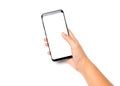 Hand holding cell phone blank on white screen Royalty Free Stock Photo
