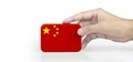 Hand holding Chinese flag. china flag in hand Royalty Free Stock Photo