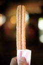 Hand Holding Churro Dessert Royalty Free Stock Photo