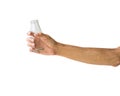 Hand holding clear bottle isolated on white background. Clipping path of transparent bottle Royalty Free Stock Photo