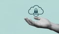 Hand holding cloud storage security icon with padlock and sync arrows, concept for secure Royalty Free Stock Photo