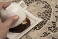 Hand holding coffee cup in order to tell fortune Royalty Free Stock Photo