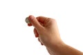 Hand holding coin