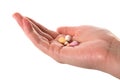 Hand holding colorful pills Royalty Free Stock Photo