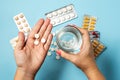 Hand Holding Colorful Pills Royalty Free Stock Photo