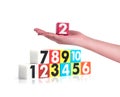 Hand holding colorful plastic numbers on white background ,No1 Royalty Free Stock Photo