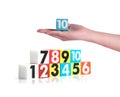 Hand holding colorful plastic numbers on white background ,No10 Royalty Free Stock Photo