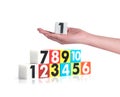 Hand holding colorful plastic numbers on white background ,No1 Royalty Free Stock Photo