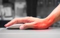 Hand holding computer mouse having wrist pain Royalty Free Stock Photo