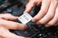 Hand holding computer processor chip. electronic engineer installing Ryzan microprocessor. Russia, 17.08.2021