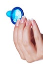 Hand holding a condom Royalty Free Stock Photo