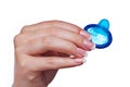 Hand holding a condom Royalty Free Stock Photo