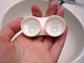 Hand Holding Contact Lens Case Royalty Free Stock Photo