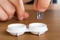 Hand holding contact lens Royalty Free Stock Photo